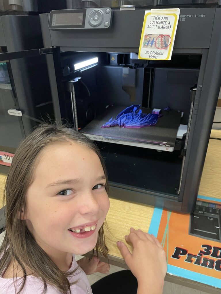 Girl with 3-D printer