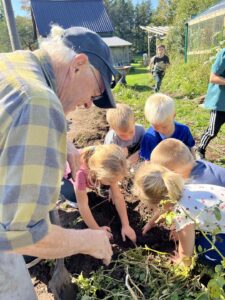 Kids working with plants