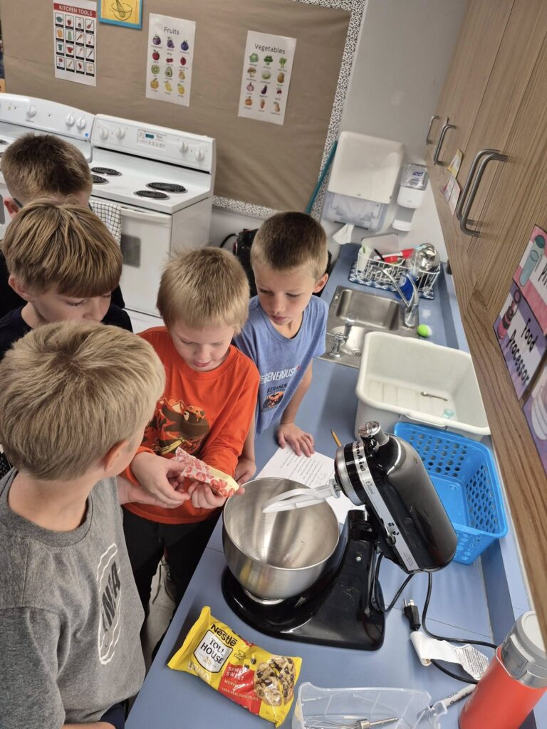 Boys making cookies