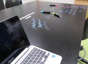 laptop on writable desk