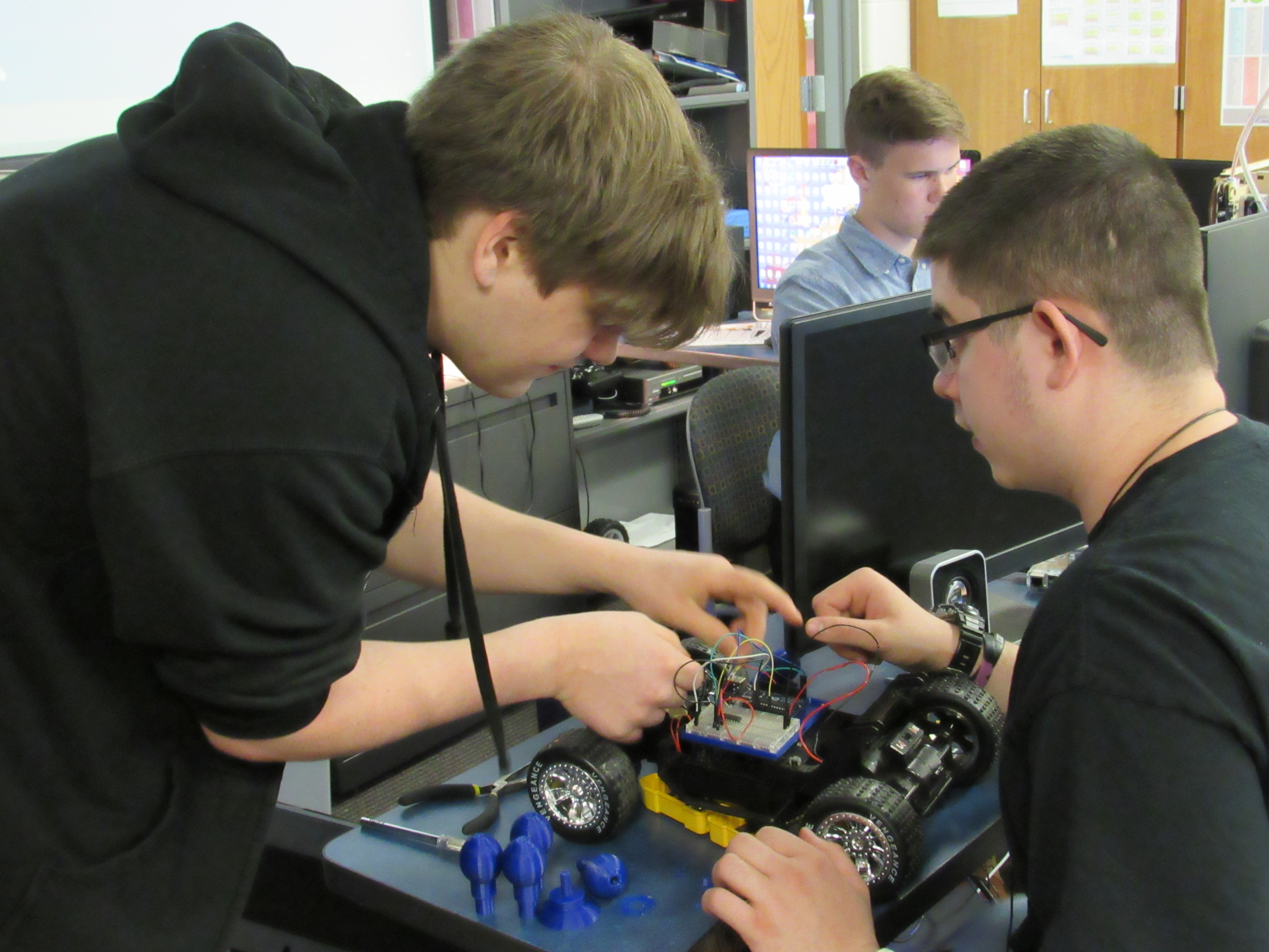 two students working on a project together