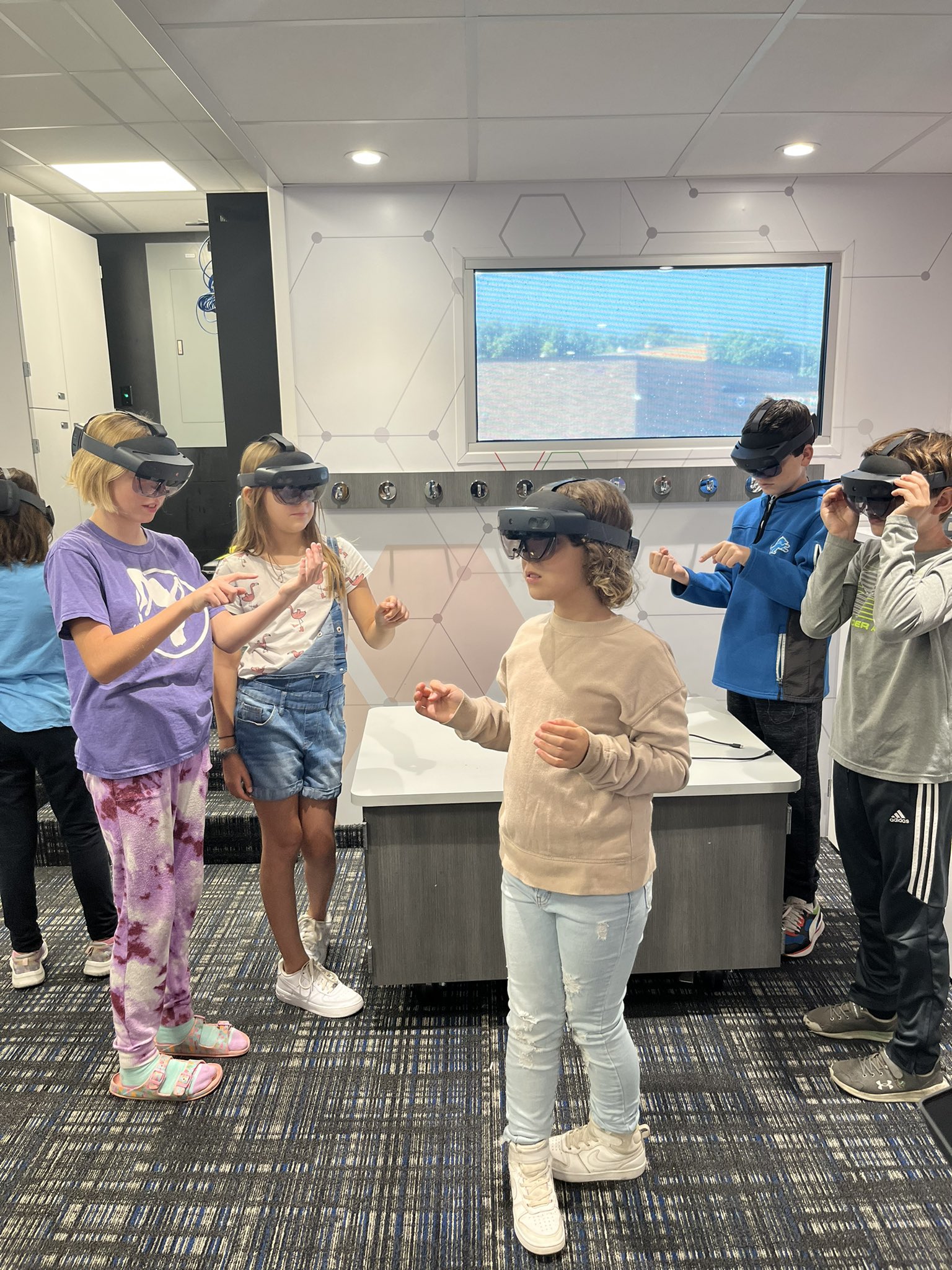 Girls with VR goggles on